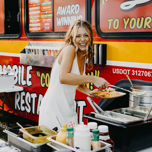 smiling woman in mobile kitchen