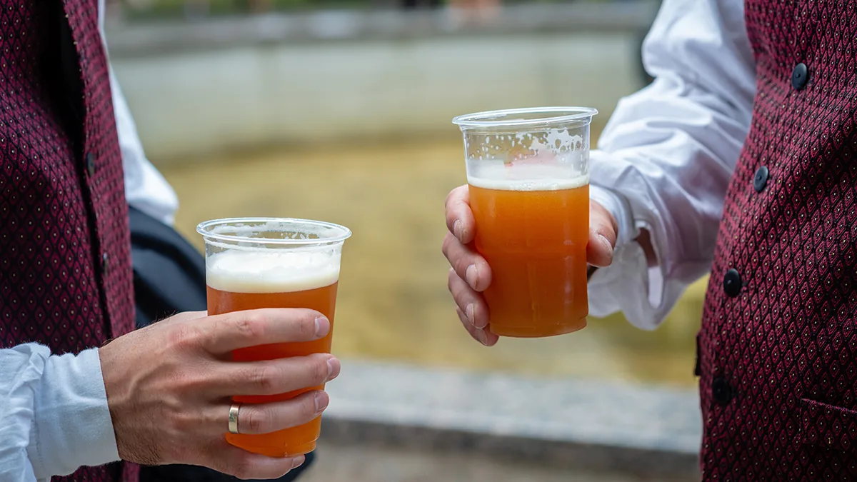 Craft beer poured to pair with wedding menu dishes